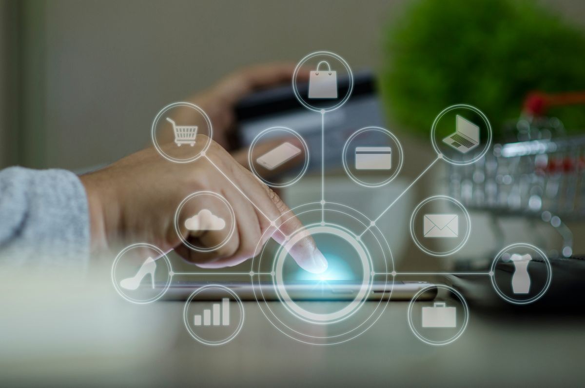 Woman hand holding smartphone and using credit card at home for online shopping Smart icon technology.shopping online concept.